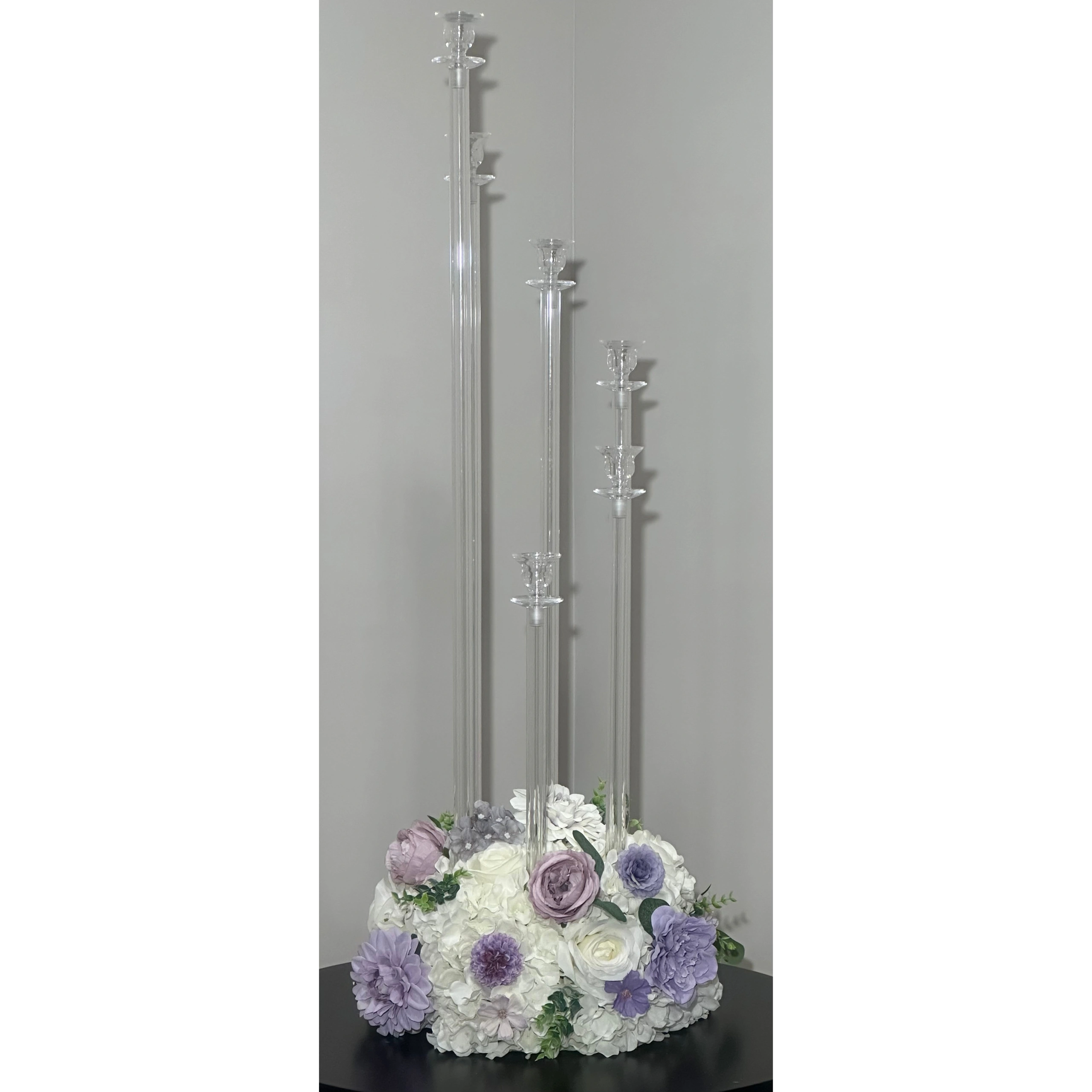 Six arm acrylic candelabra.  LED candles included.