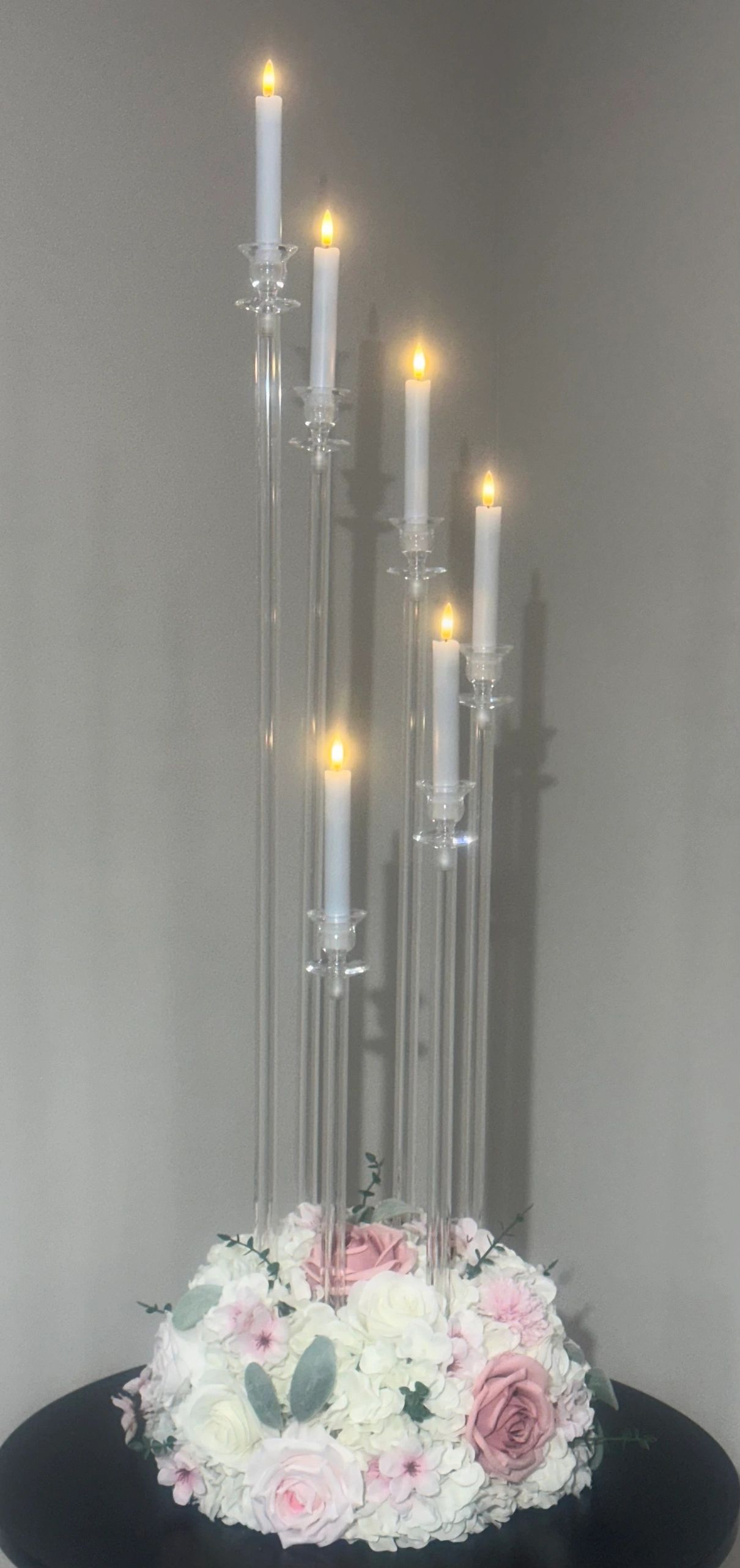 Six arm acrylic candelabra.  LED candles included.