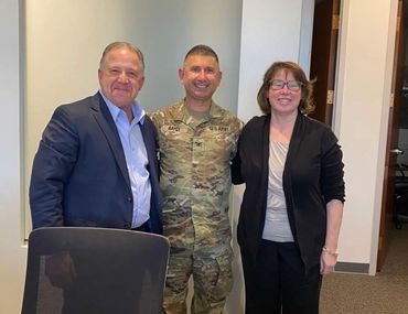 Alex Navarro Celebrates Loan Closing with Happy Military Client: Building Financial Success Together