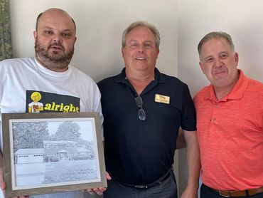 Successful Home Purchase Celebration: Bill DePugh and Alex Navarro, along with Satisfied Clients