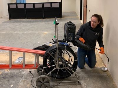 CCTV camera inspection in commercial office building.