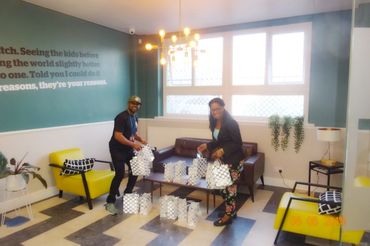 Handing out gift bags for our widows
