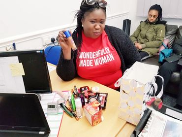 Volunteer packing gifts for our widows