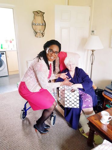 Gifts being handed to a widower