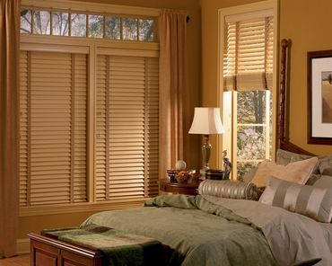 Custom painted wood window blinds with decorative cloth tapes for style and light control