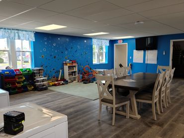 Our beautiful community laundry which includes a coffee bar and children's play area.