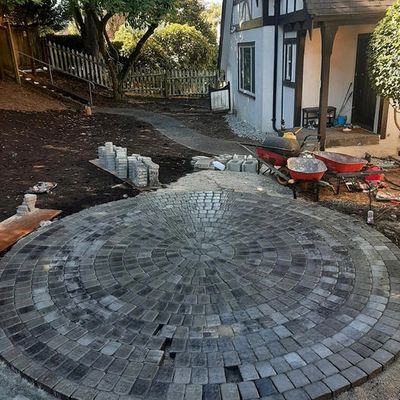 Modern circle kit of roman style paver stones for a patio in Vancouver BC - professionally installed