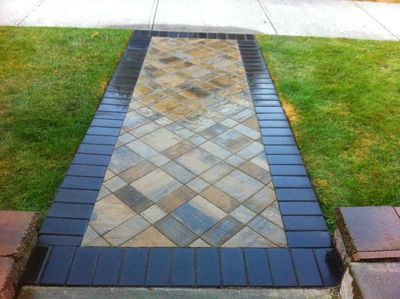 Paver stone walkway with soldier course charcoal border with diagonal double standard, standard, and