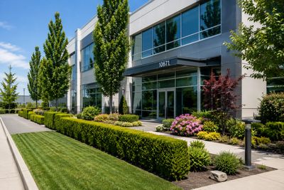 Commercial landscape maintenance services in Richmond BC including lawn care hedge trimming and gard