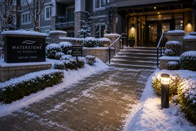 Cleared snow walkway and salted entrance at a Richmond BC condo and townhouse strata property during