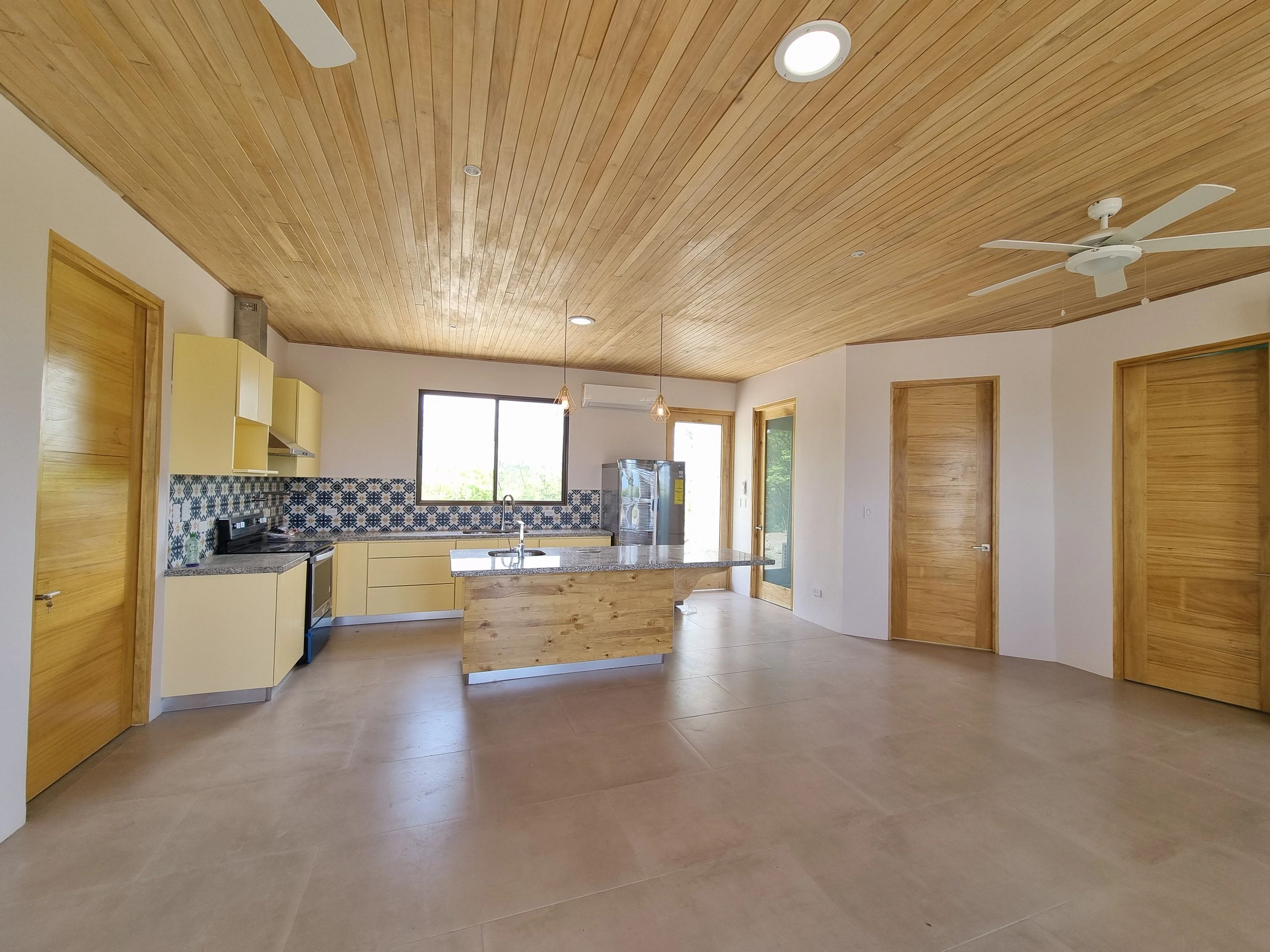 Kitchen, wood cabinets, granite countertops. Fan ceilings and A/C
Design Permitting Build Costa Rica