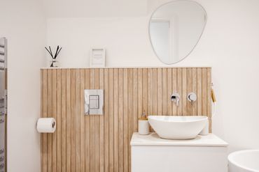 wood slated bathroom tiles modern bathroom vanity unit mirror clean wall hung toilet