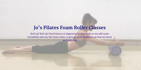 Woman using a foam roller in a Pilates class for balance and alignment.