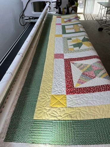 Long arm quilting machine in action