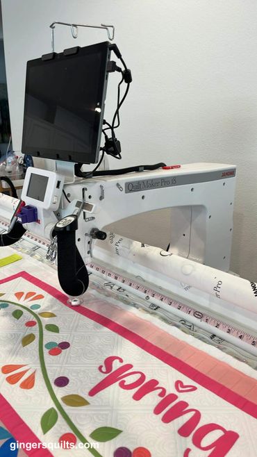Long arm quilting machine in action