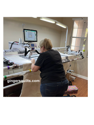 Client lesson with long arm quilting machine