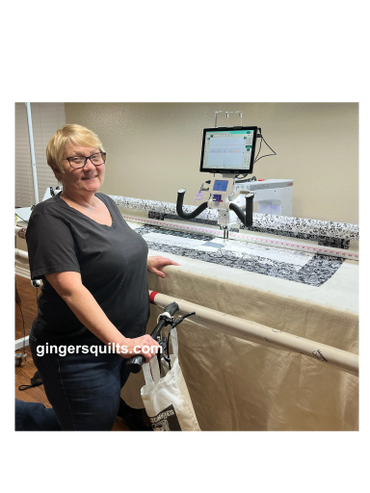 Client lesson with long arm quilting machine