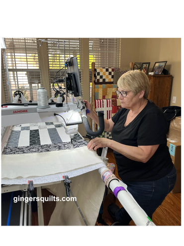 Client with long arm quilting machine