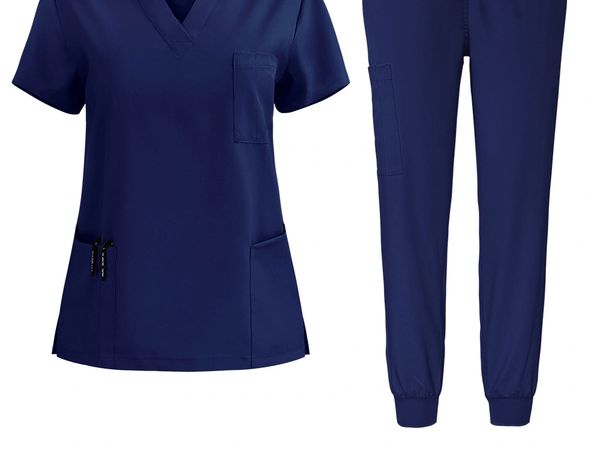 Navy blue medical scrub set with a V-neck top and jogger-style pants.