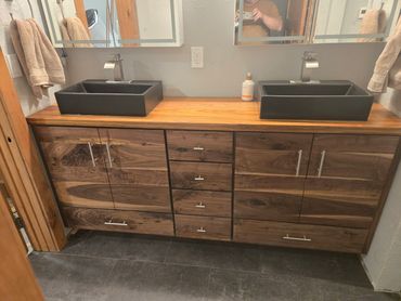 Solid Walnut vanity build with Canarywood counter top.