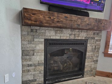 Faux beam mantle build and stone surround install
