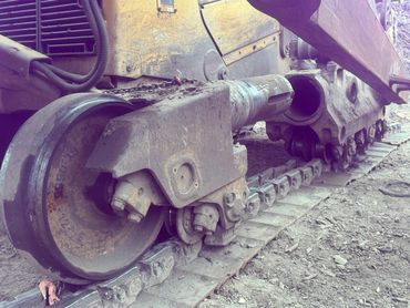 Removing front idler for new seals.