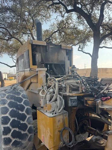 Cab removed to replace hydraulic pump.