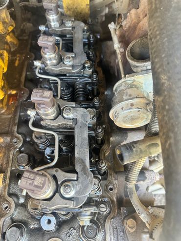 Valve cover removed for injector replace.