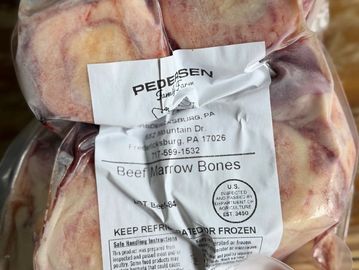 Packaged beef marrow bones labeled from Pedersen Farms.