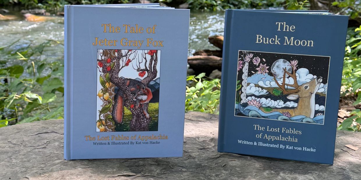 Two illustrated books titled The Tale of Jeter Gray Fox and The Buck Moon.