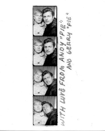 Andy Warhol and Gerard Malanga in photo booth.