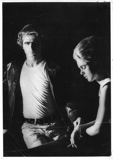 Black and White photograph of Warhol Superstars Gerard Malanga and Edie Sedgwick.