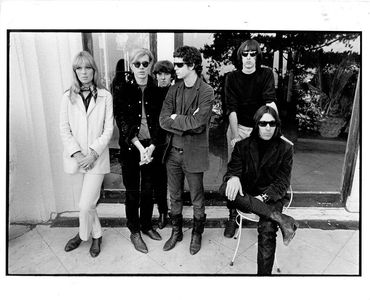 Black and white photo taken by Gerard Malanga of Andy Warhol and The Velvet Underground