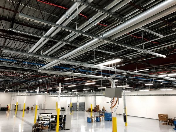 Industrial warehouse interior with exposed ceiling