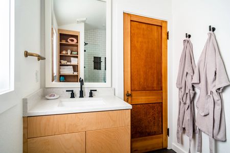 Spacious beautiful stand up shower and two soft, luxurious robes await your arrival.