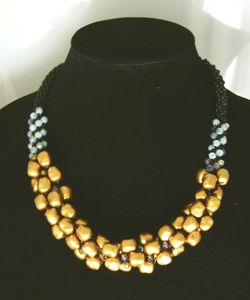 JC: Gold Nugget and Silver Crystal Beads, Kumihimo necklace with magnetic clasp. 

Length: 

Price: 