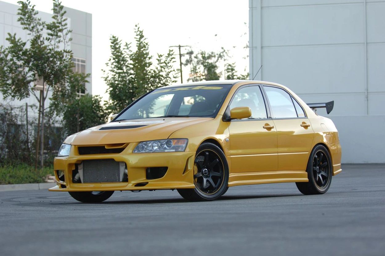 2003_Mitsubishi_Evo_yellow_1.jpg