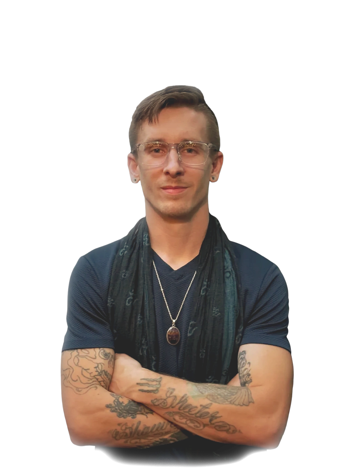 Man with glasses and tattoos crossing his arms.