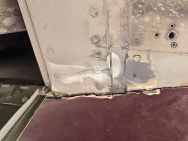 A crack found in a Piper Aerostar wing spar.