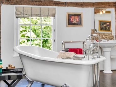 Luxury bathroom with freestanding bath in a traditional Suffolk period property