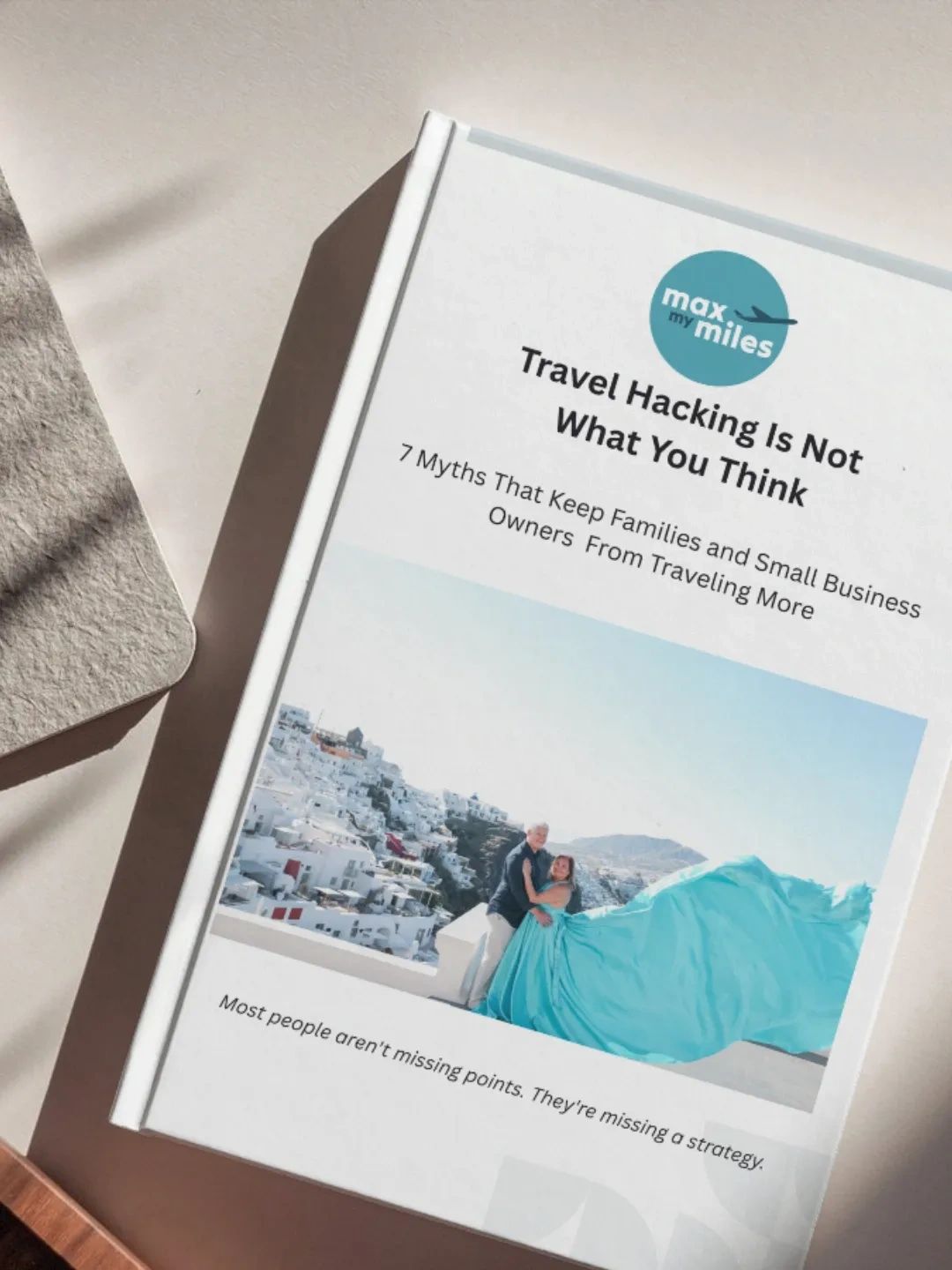 Book titled 'Travel Hacking Is Not What You Think' with a couple photo on the cover.