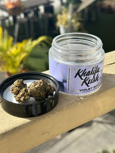 A container of Khalifa Kush Violet Sky strain available at Santa Barbara Collective