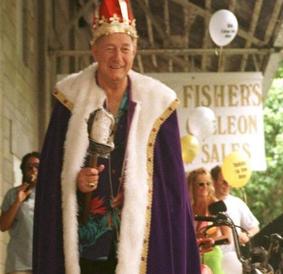 Mel Fisher, with his conch cepter, leads a parade of fans through Key West’s Old Town on Mel Fisher
