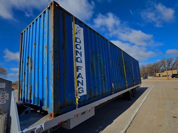 Cargo Worthy Shipping Container in blue heading north to Minnesota for a customer