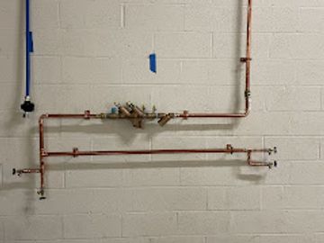 Installing a backflow preventer for a local car wash