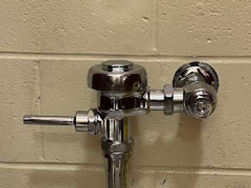 Replacing a sloan flush valve at a local school.