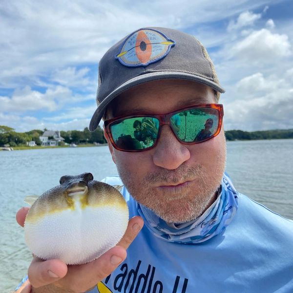 Camp director Eric Wurzburg with Puffer fish