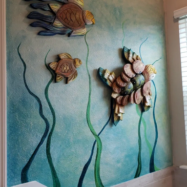 Hand-painted mural, sea turtles sculpture on hand-painted background