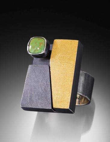 rectangular ring with a geometric pattern