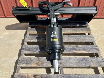 Stinger hydraulic attachment on wooden pallet.